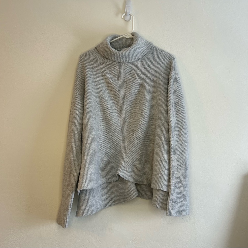 Gray Knit Turtleneck Sweater with Asymmetrical Hem